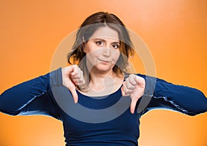 off woman, giving thumb down gesture with hand