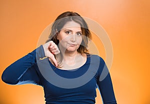 off woman, giving thumb down gesture with hand