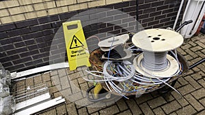 Offcuts of scrap electrical cable in a wheelbarrow