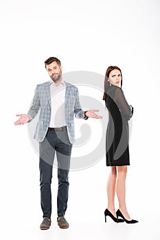 Offence young loving couple standing isolated