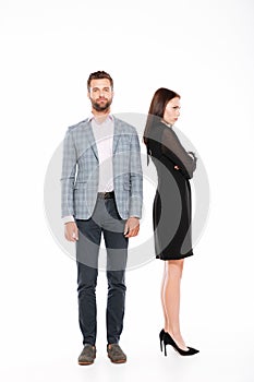 Offence young loving couple standing isolated photo