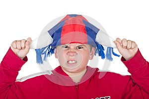 Offended boy in a fan helmet