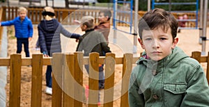 Offended boy on playground