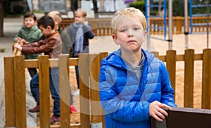 Offended boy on playground