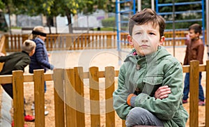 Offended boy on playground