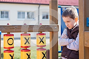 Offended boy on the playground