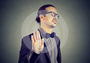 Offended man giving stopping gesture