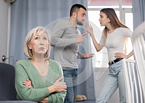 Offended mother dont speaking with adult children during home quarrel
