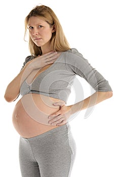 Offended pregnant woman in gray suit