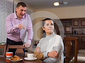 Offended woman with angry husband
