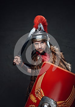 Offensive antique rome fighter with shield and sword