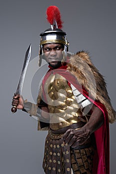 Offensive roman soldier of african ethnic with gladius