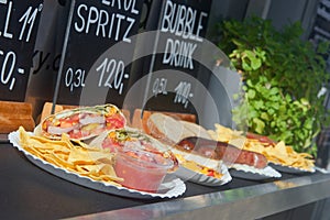 Offer of fresh dishes for visitors of food truck festival in Karlin