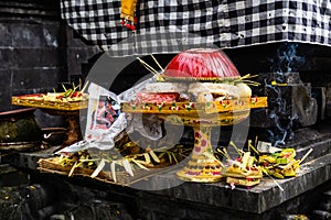 Offerings for the Hindu Gods and Demons at Balinese Hindu temple on Bali island, Indonesia