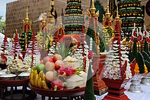 Offerings in vases of fruit and flowers. Buddism