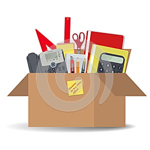 Office accessories in a cardboard box