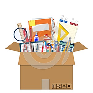 Office accessories in cardboard box.