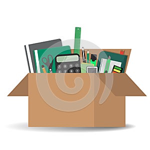 Office accessories in a cardboard box isolated on a white background