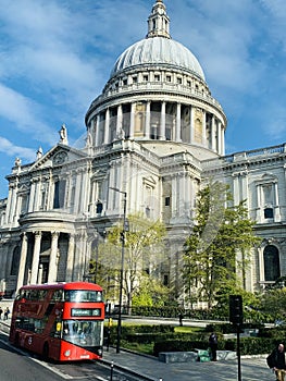 St. Paul`s Cathedral seen from a double decker red bus in the city, England