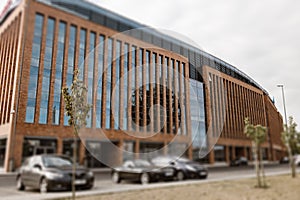 Office building with motion blurred clouds, business concept. Office building in Szczecin, Poland