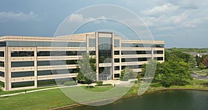 Office building with pond in a suburban setting