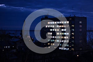 Office buildings corporation at night, industrial district, shipyard. Late work