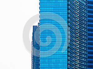 Office buildings windows. Blue glass architecture facade design with reflection of sky in urban city, Downtown Singapore City in