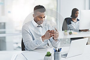 Office, business and man with smartphone, typing and connection with social media, laptop and internet. Employee, staff