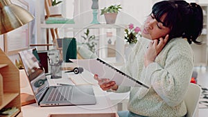 Office business woman on a phone call with portfolio, laptop and networking for project management, marketing agency or