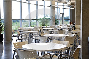 Office cafeteria with centered table. photo