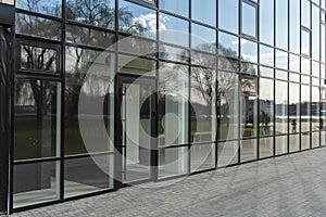 Office center glass exterior wall building paved street walk side urban modern architecture background