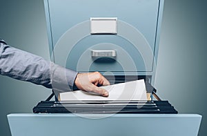 Office clerk searching for files