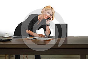 Office corporate portrait of young beautiful and happy business woman working relaxed at laptop computer desk smiling confident in