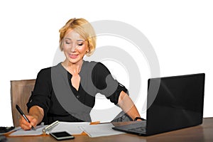 Office corporate portrait of young beautiful and happy business woman working relaxed at laptop computer desk smiling confident in