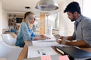 Office coworkers in business meeting discussing project plans