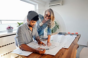 Office coworkers in business meeting discussing project plans