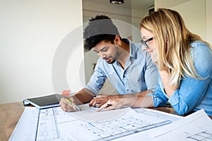 Office coworkers in business meeting discussing project plans