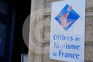 Office de tourisme French tourism office sign on wall building in France