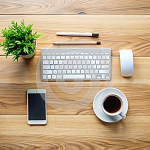 Office Desk with Computer and Coffee Cup Top View photo