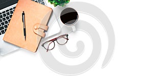 Office desk with computer, Pen, eyeglass, mouse, notebook, Cup of coffee on white background, Top view with copy space