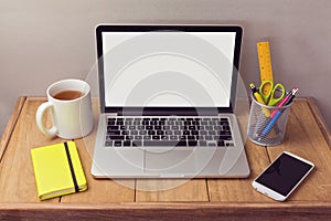 Office desk mock up with laptop and office items