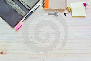 Office desk mock up template with notebook, diary cover and pen.