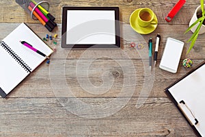 Office desk mock up template with table, smart phone, notebook and cup of coffee