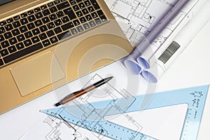 An office desk with the project papers