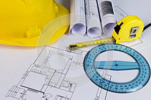 An office desk with the project papers