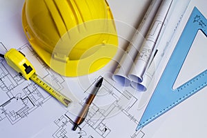 An office desk with the project papers