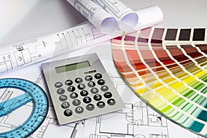 An office desk with the project papers