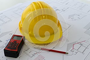 An office desk with the project papers