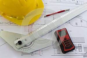 An office desk with the project papers