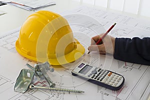 An office desk with the project papers